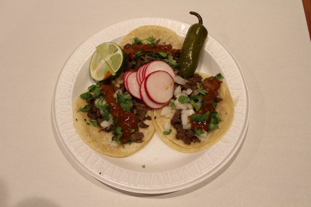 Carne asada tacos with sliced radishes, jalepeno, and lime!