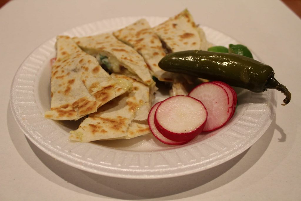 Quesadilla, jalepeno, and sliced radishes