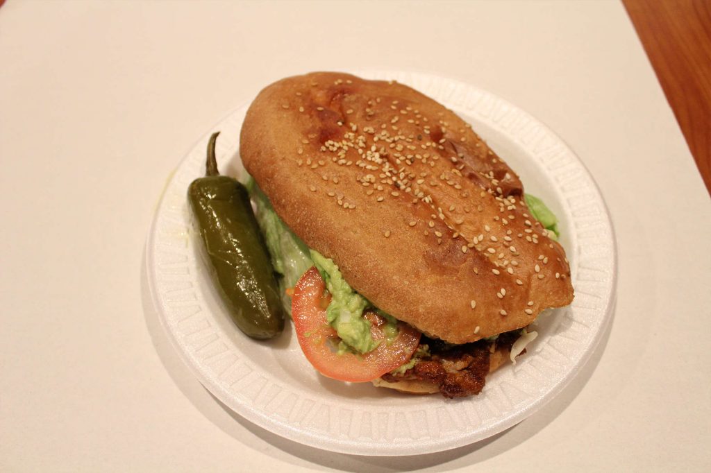 A delicious torta with a jalepeno on the side
